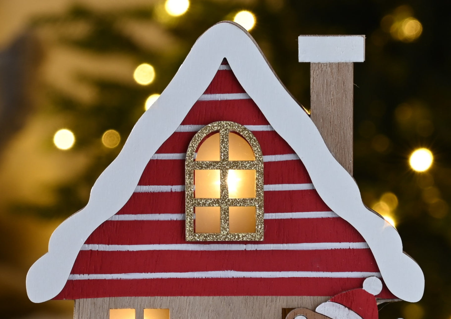 Lit Wooden House with Christmas Bear Decoration