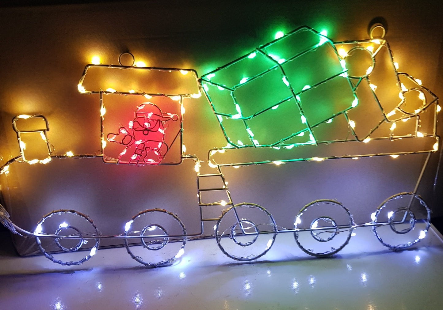 Animated Santa Train Illuminated Wall Decoration with Rotating Wheels