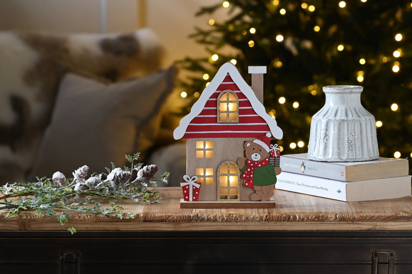 Lit Wooden House with Christmas Bear Decoration