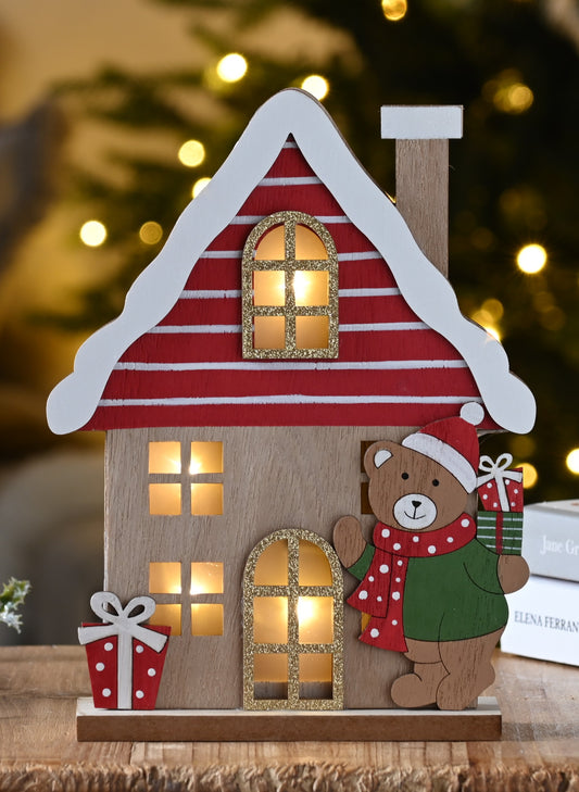 Lit Wooden House with Christmas Bear Decoration
